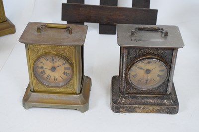 Lot 611 - American Arts & Crafts wall clock, plus musical alarm clocks