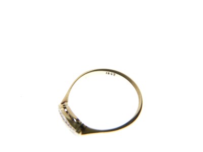 Lot 10 - Yellow metal (18ct), platinum and diamond five-stone ring