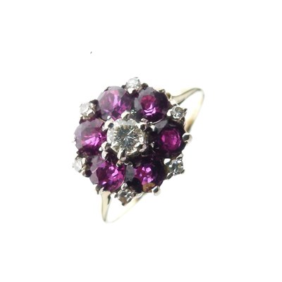 Lot 18 - Ruby and diamond set gold cluster ring