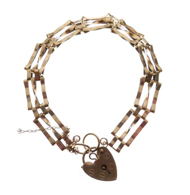 Lot 86 - 9ct gate-link bracelet with heart padlock