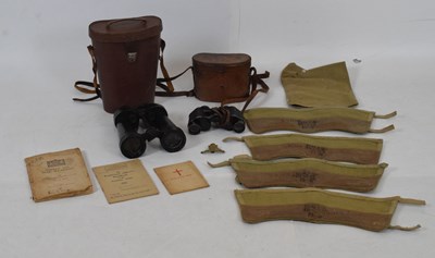 Lot 223 - Two military issue cased binoculars