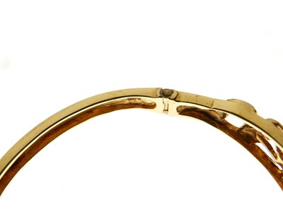 Lot 82 - 9ct gold and seed pearl snap bangle