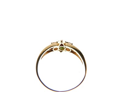 Lot 25 - Yellow metal (875) three-stone ring