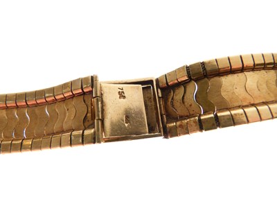 Lot 125 - Yellow metal (750) flexible watch strap