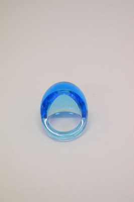 Lot 427 - Lalique - 'Roxanne' knife rest and a blue cabochon ring