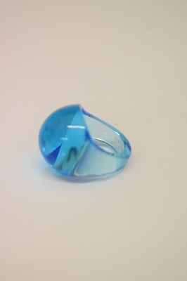 Lot 427 - Lalique - 'Roxanne' knife rest and a blue cabochon ring