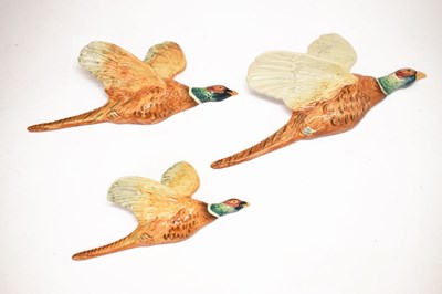 Lot 445 - Beswick - Three flying pheasants