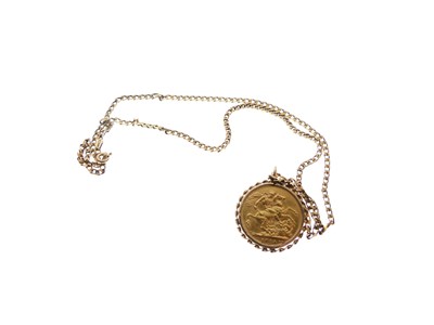 Lot 62 - George V gold sovereign, 1914, mounted, with 9ct chain