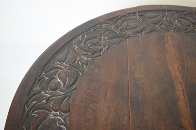 Lot 700 - Early 20th Century oak oval gateleg table, having carved border