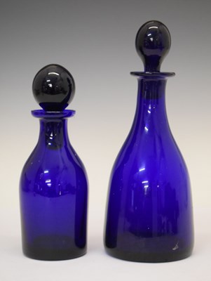 Lot 417 - Thomas Webb blue glass mallet shaped decanter and one similar smaller decanter