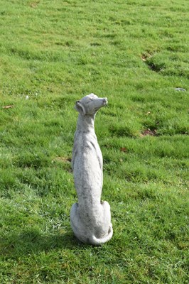 Lot 809 - Composition stone garden ornament of a whippet