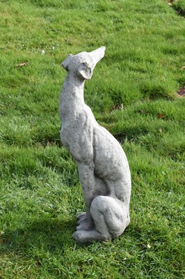 Lot 809 - Composition stone garden ornament of a whippet