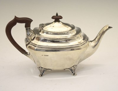 Lot 160 - George V silver teapot of shaped rectangular form standing on four cast feet