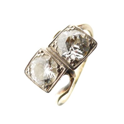 Lot 275 - Two-stone diamond crossover ring