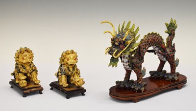 Lot 519 - Chinese enamel dragon and pair of dogs