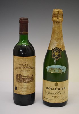 Lot 358 - Chateau Lafitte Carcasset 1985, and Bollinger Cuvee Champagne with Tiffany 1986 label