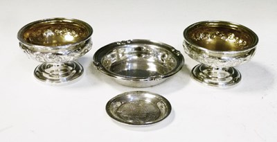 Lot 150 - Pair of Georgian silver pedestal salts, and two dishes