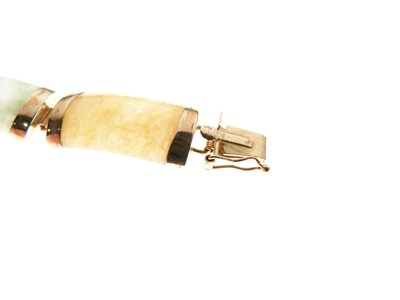 Lot 77 - Multicolour jade panel bracelet