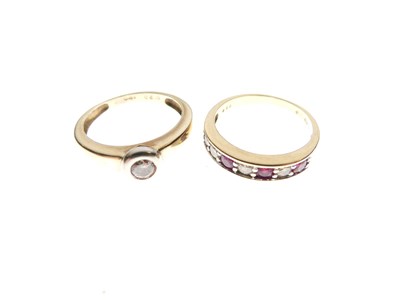 Lot 18 - 9ct gold and solitaire diamond ring and an 18ct gold and seven stone ruby and diamond ring