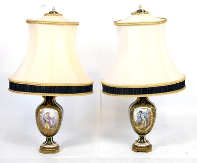 Lot 412 - Pair of early 20th Century porcelain lamps