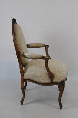 Lot 192 - French style carved open armchair