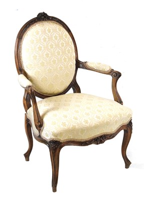 Lot 192 - French style carved open armchair
