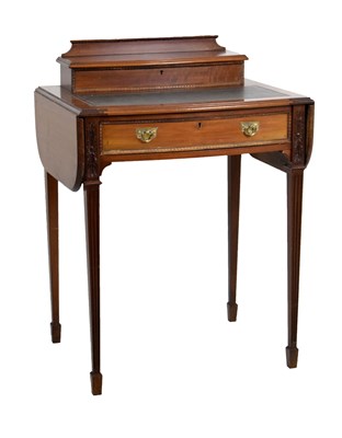 Lot 613 - Edwardian mahogany writing table