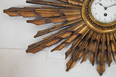 Lot 502 - Early 20th Century giltwood sunburst wall clock