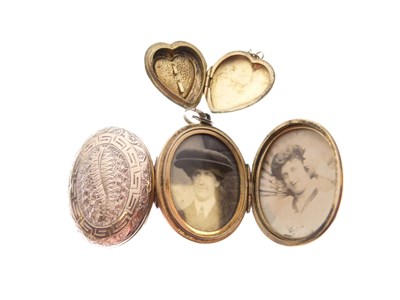 Lot 52 - Late Victorian double locket, heart-shaped locket and Art Deco locket