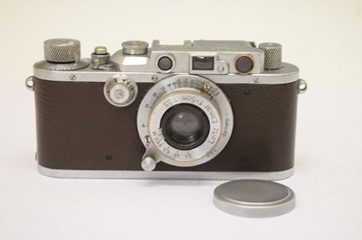 Lot 282 - Leica IIIa camera,  1936, No. 185142 with Elmar f=5cm, 1:3.5 lens