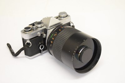 Lot 294 - Olympus OM-1 35mm SLR camera, with a 500mm Makinon mirror lens