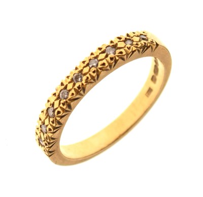 Lot 6 - 18ct gold diamond nine-stone ring