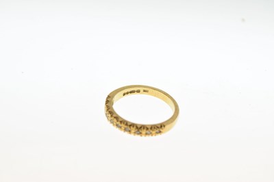 Lot 6 - 18ct gold diamond nine-stone ring