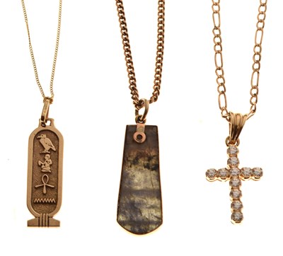 Lot 50 - Three  gold and yellow metal pendants with chains