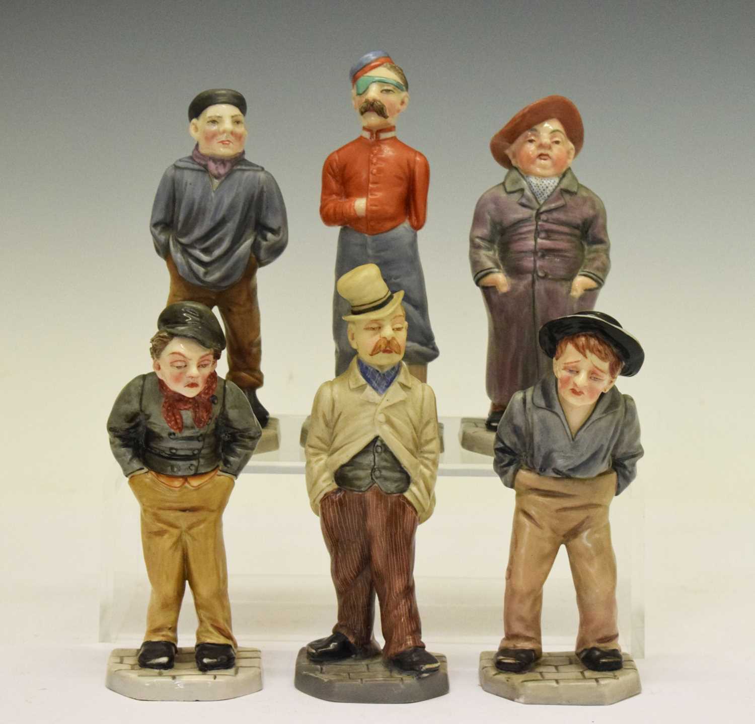 Lot 450 - Royal Worcester - Set of six 'Down and Out' menu holder figures