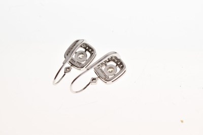 Lot 40 - Pair of pavé set diamond cluster earrings