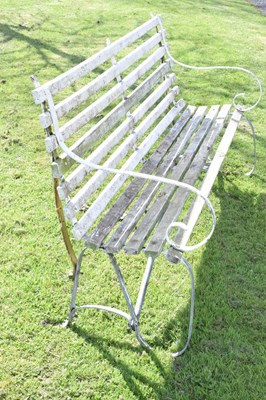 Lot 668 - Three seater white painted wooden garden bench