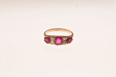 Lot 12 - Seven-stone ruby and diamond ring