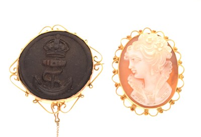 Lot 46 - Royal Navy pressed horn button and a shell cameo brooch (2)