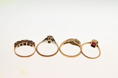 Lot 21 - Four 9ct gold stone set dress rings