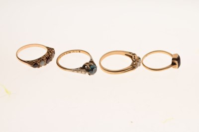 Lot 21 - Four 9ct gold stone set dress rings
