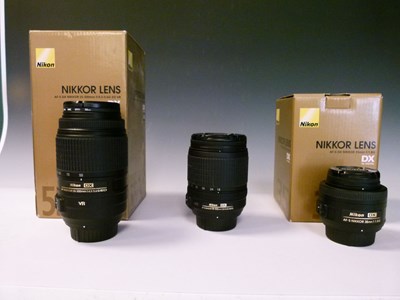 Lot 253 - Three Nikon camera lenses