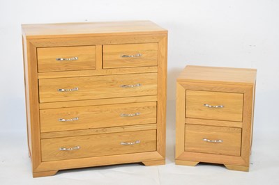 Lot 660 - JB Global modern light oak chest and side cabinet