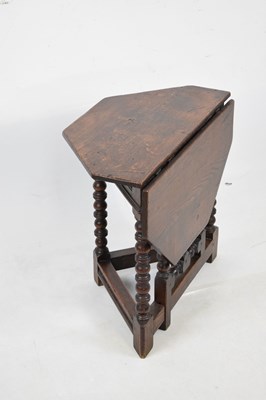 Lot 587 - Small oak 'credence' style occasional table