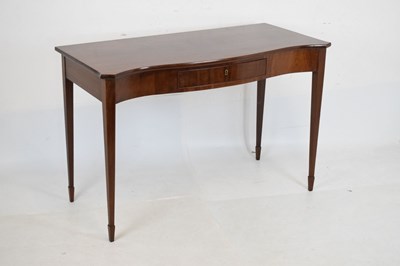 Lot 580 - George III style mahogany serpentine-fronted serving table