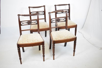 Lot 628 - Set of four early 19th Century mahogany bar-back dining chairs