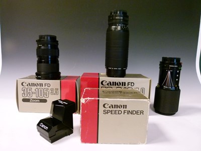 Lot 259 - Three Canon Zoom FD lenses and Speed Finder