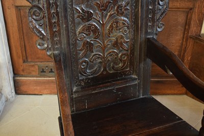 Lot 20 - Charles II oak panel-back open armchair