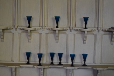 Lot 30 - Set of nine 19th Century peacock blue glass wine glasses