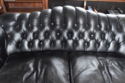 Lot 45 - Modern deep-buttoned black leatherette lounge suite